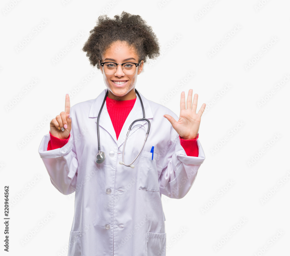 Young afro american doctor woman over isolated background showing and pointing up with fingers number six while smiling confident and happy. Young afro american doctor woman over isolated background showing and pointing up with fingers number six while smiling confident and happy.