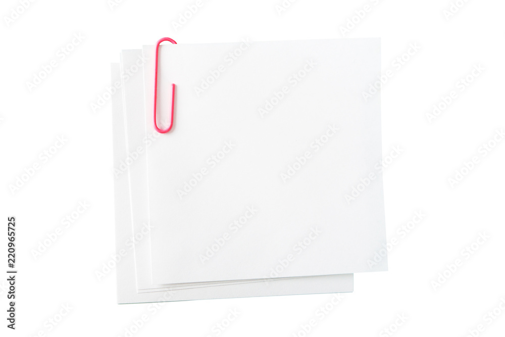 white paper for notes, pink paper-clip on white white paper for notes, pink paper-clip on white