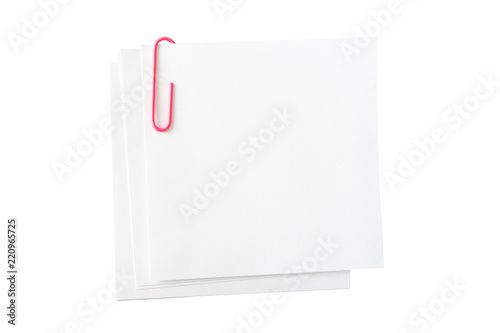 white paper for notes, pink paper-clip on white