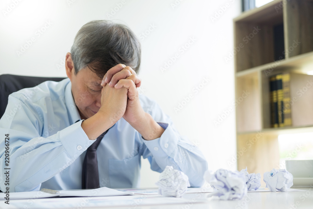 Depressed failure and tired businessman late sad and solving problem in office. in meeting room. stressed and worried at work crisis concept
