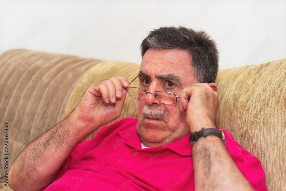 Obraz premium Closeup portrait senior, elderly man in glasses, looking shocked.