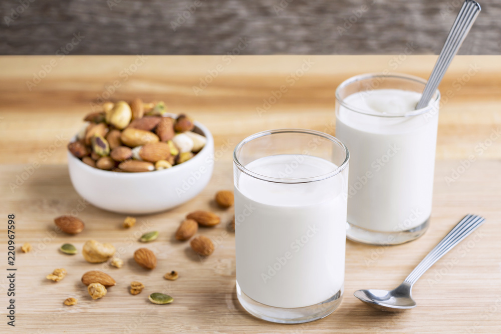 Yogurt in two glasses with dried fruit is a healthy breakfast. Yogurt in two glasses with dried fruit is a healthy breakfast.
