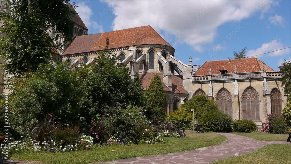 Garden and cathedral exterior in Lisieux, Normandy France Garden and cathedral exterior in Lisieux, Normandy France
