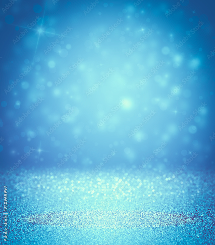 Blue sparkle rays lights with bokeh elegant show on stage abstract background. Dust sparks background. Blue sparkle rays lights with bokeh elegant show on stage abstract background. Dust sparks background.