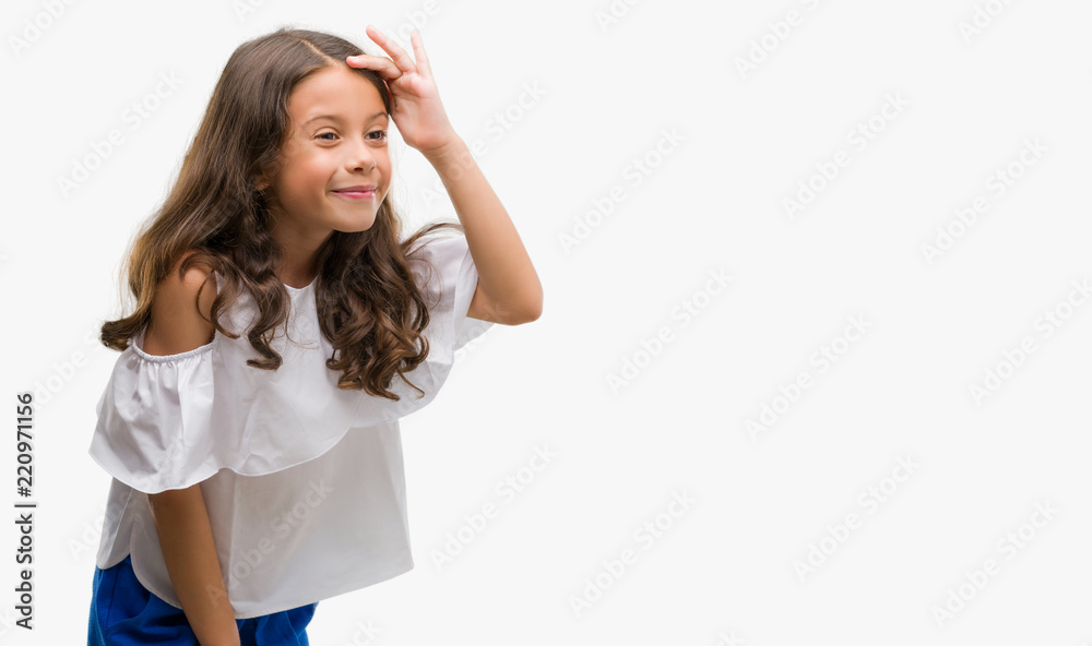 Brunette hispanic girl very happy and smiling looking far away with hand over head. Searching concept. Brunette hispanic girl very happy and smiling looking far away with hand over head. Searching concept.