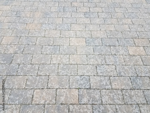 grey rectangle bricks on the ground or floor