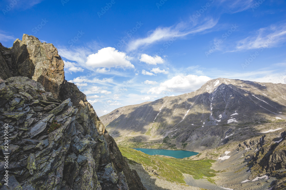 Lower Akchan lake view from the Kuiguk Pass. Mountain Altai landscape