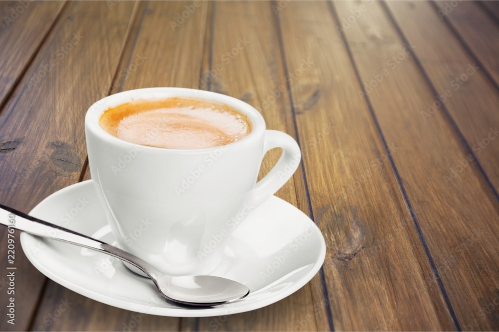 Black coffee in white cup isolated on background Black coffee in white cup isolated on background