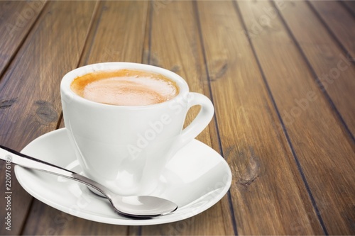 Black coffee in white cup isolated on background