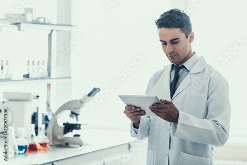 Young Scientist doing Research in Laboratory