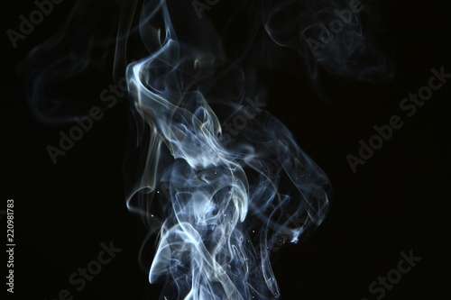 lovely flowing contrast bright smoke on the black background.