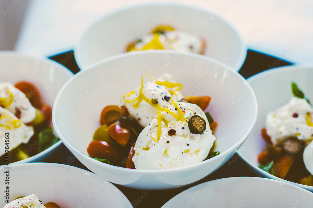 luxurious cuisine starter with buratta tomato lemon and jalapeno soft filter delicious food