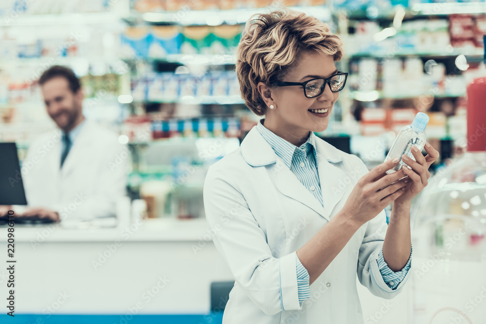 Portrait Smiling Pharmacist Working in Drugstore