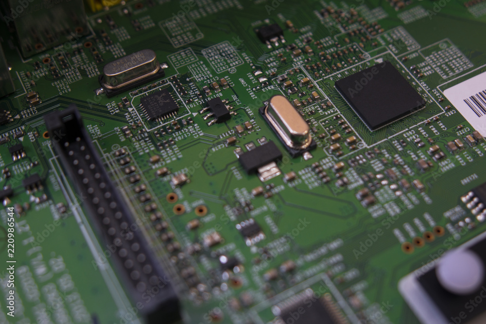 Lcd tv electronic circuit. Green color, faded at the sides. Lcd tv electronic circuit. Green color, faded at the sides.