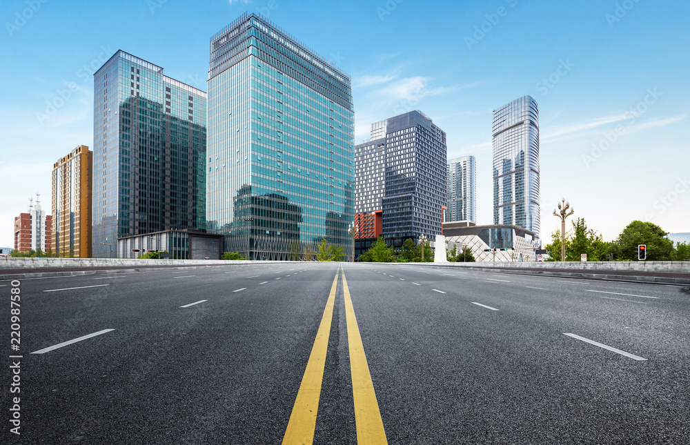 The expressway and the modern city skyline are in chengdu, China.