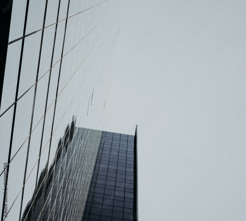 low angle view of skyscrapers Business Office with blue sky, Corporate building in city.