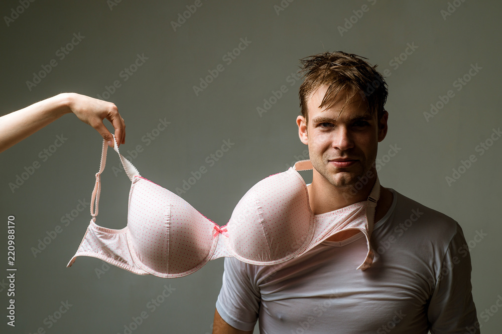Foto de Bra model. Man with big Bra in underwear. Big boobs body