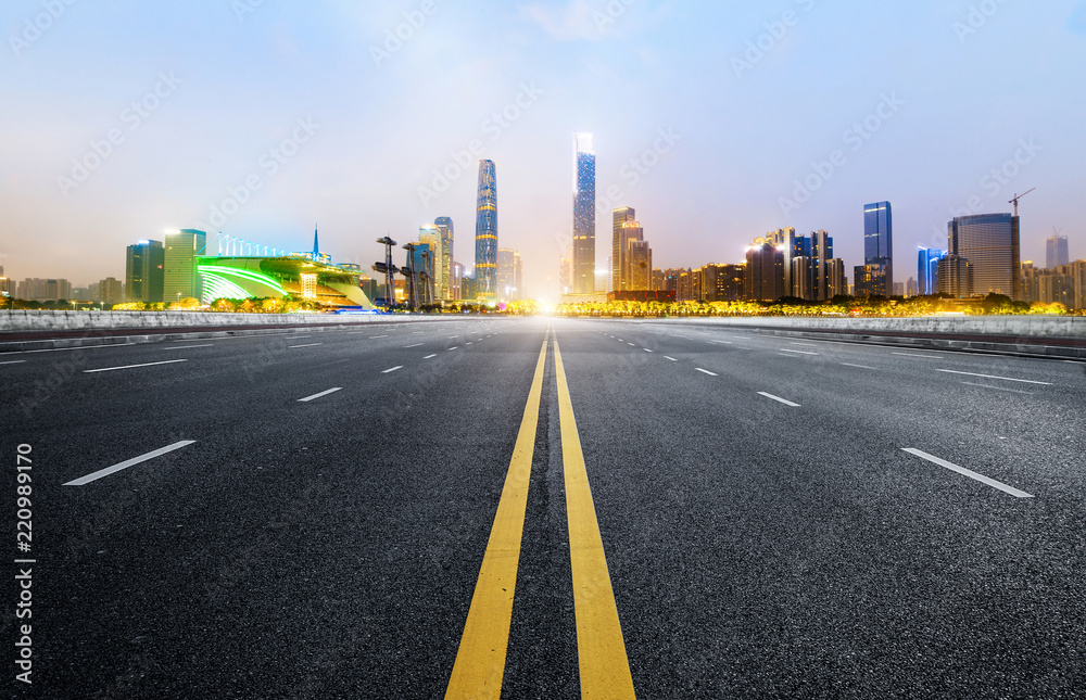 Empty road floor surface with modern city landmark buildings of guangzhou bund Skyline