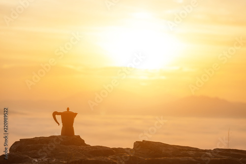 Geyser aluminium coffee maker on the background of fog mountians