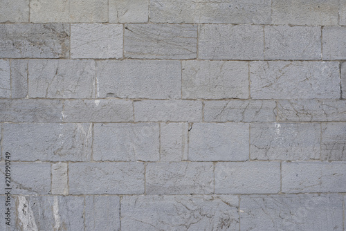 Obraz na plátně Stone wall background and ancient tuff, Tuscany in Italy