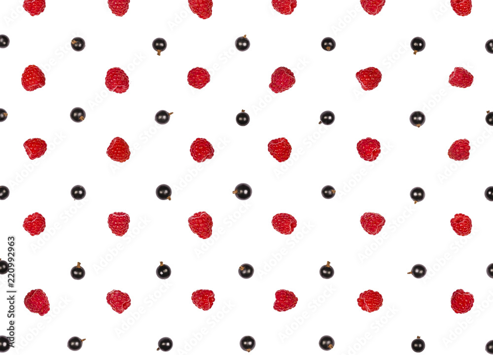 Raspberry and black currant pattern isolated on white background. Top view. Flat lay Raspberry and black currant pattern isolated on white background. Top view. Flat lay