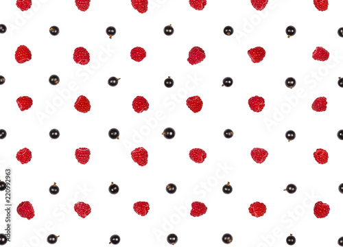 Raspberry and black currant pattern isolated on white background. Top view. Flat lay