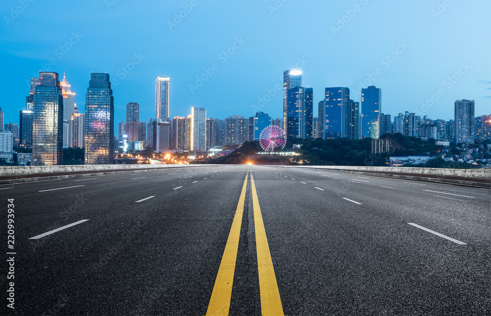 The expressway and the modern city skyline are in Chongqing, China. The expressway and the modern city skyline are in Chongqing, China.