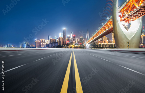 The expressway and the modern city skyline are in Chongqin.g, China