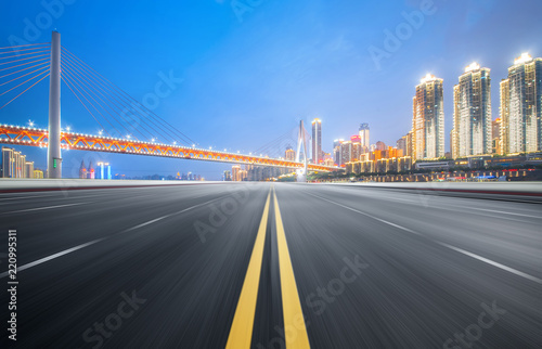 The expressway and the modern city skyline are in Chongqin.g, China © onlyyouqj