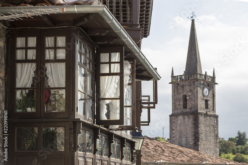 gallery and clock tower in Comillas, Cantabria, Spain