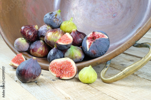fresh figs in a copper jam pot, fruits marmelade