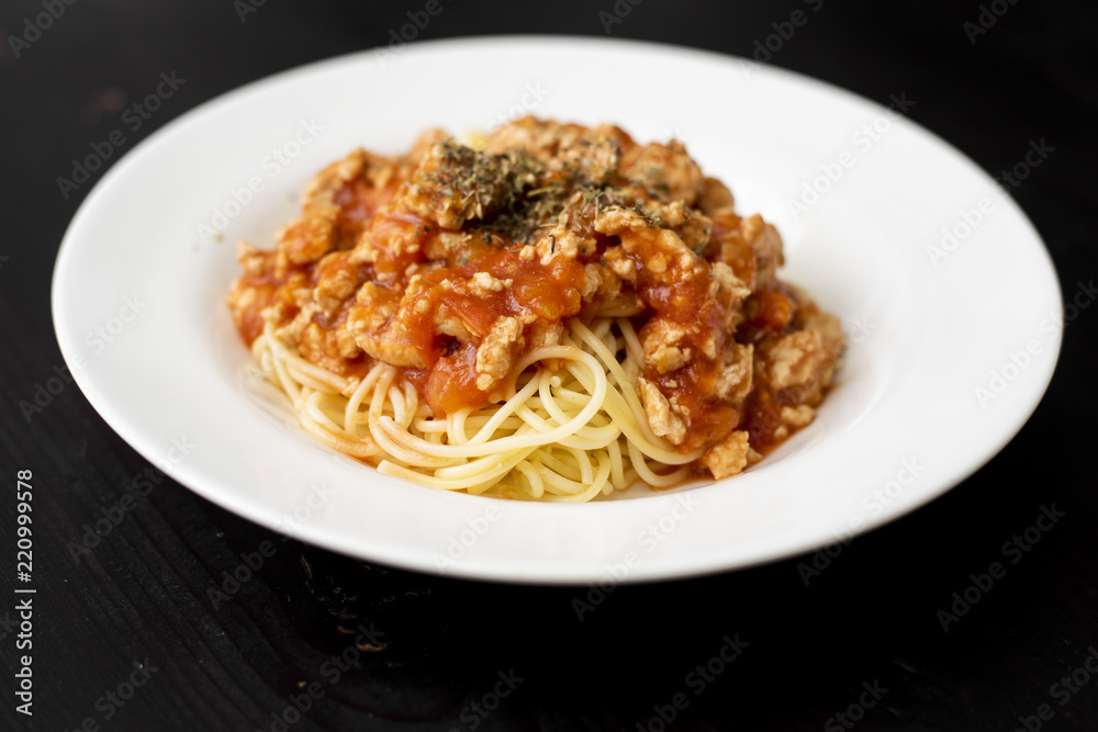 Spaghetti on black wooden background Spaghetti on black wooden background