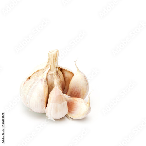 Raw garlic on white.
