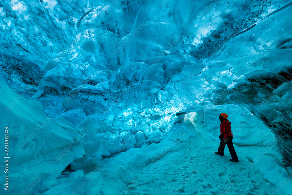 Fototapeta premium explorer inside an ice cave, vatnajokull national park, Iceland