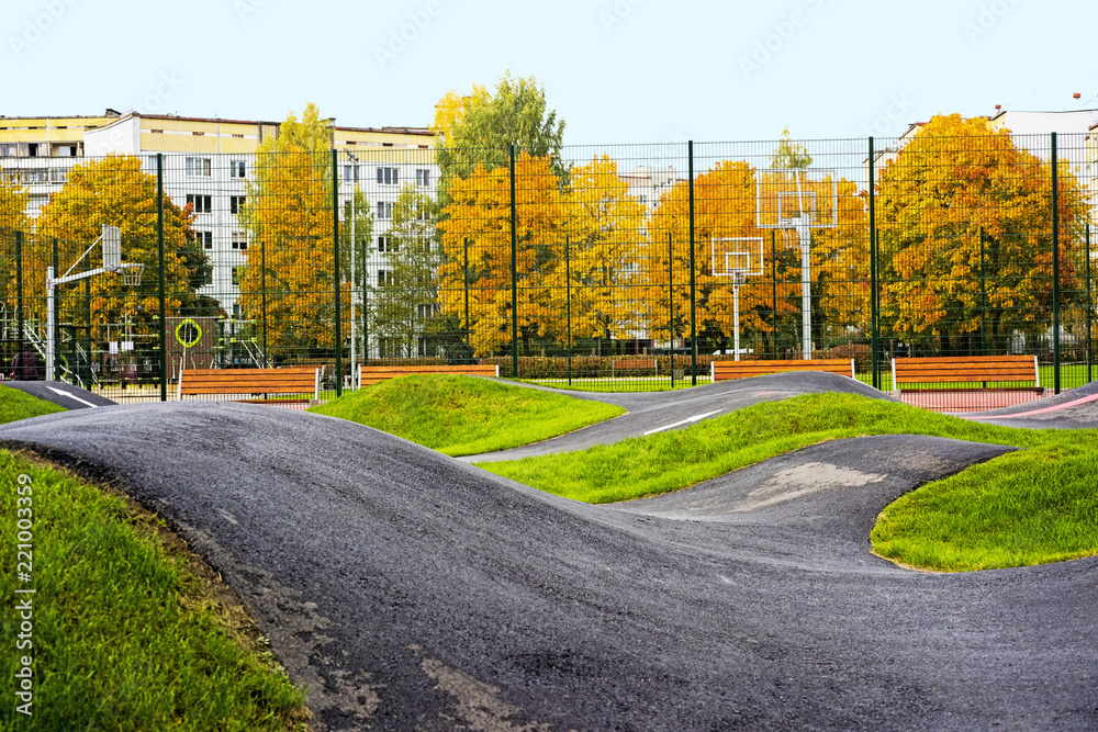Naklejka premium Bicycle track road. Located in city playground