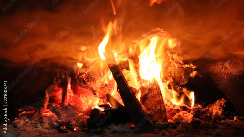 Fire wood brighly burning in furnace. Fire and flames Fire wood brighly burning in furnace. Fire and flames