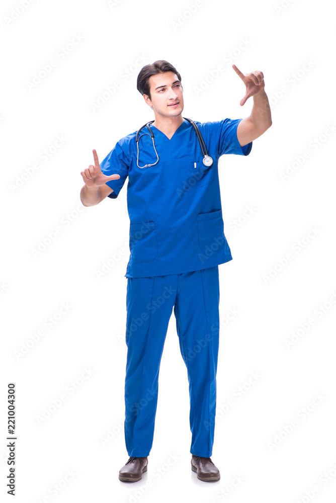 Young male doctor pressing buttons isolated on white Young male doctor pressing buttons isolated on white
