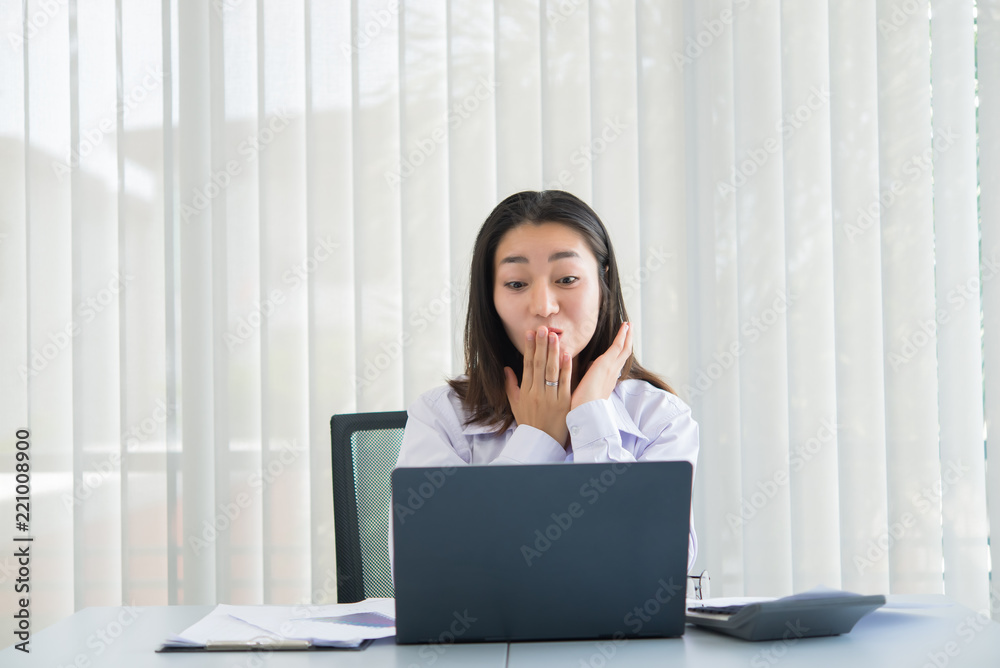 Asian business woman happy in a office,Worker success from work,Thailand people,Happiness girl concept Asian business woman happy in a office,Worker success from work,Thailand people,Happiness girl concept