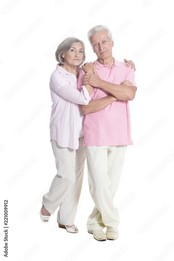 portrait of senior couple embracing on white background portrait of senior couple embracing on white background