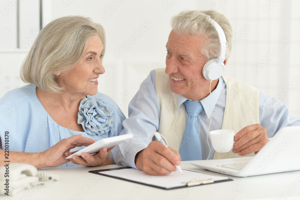 Portrait of senior businesspeople working in the office together Portrait of senior businesspeople working in the office together