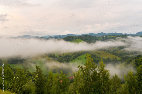 Beautiful from the nature with fog and clouds at sunset © brszattila