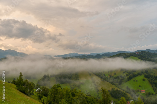 Stunning nature with misty landscape,Holbav village,Carpathians,Transylvania,Romania,Europe