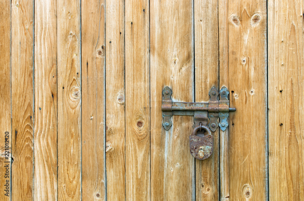 wooden gate with hinged hinges and padlock wooden gate with hinged hinges and padlock