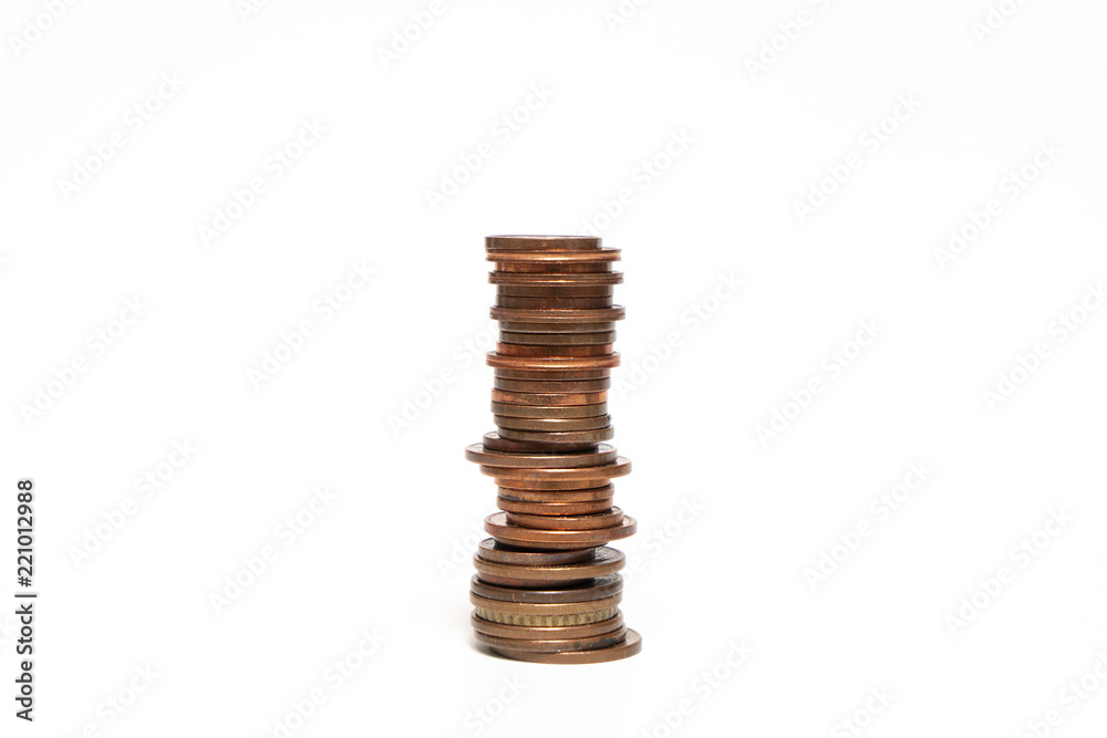 some stacked euro coins on a white surface some stacked euro coins on a white surface