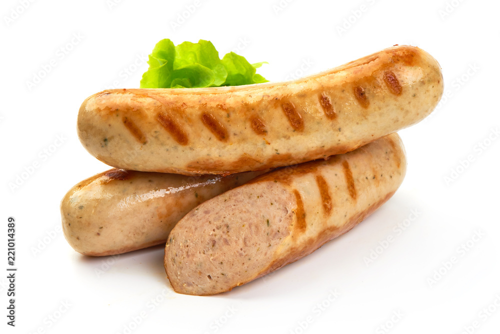 Grilled Munich sausages with green lettuce, isolated on white background. Grilled Munich sausages with green lettuce, isolated on white background.