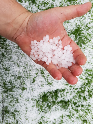 Hail on a hand after a storm