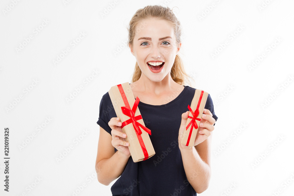Young pretty woman portrait hold stack of gift boxes. Smiling happy girl in t-shirt on white background. Holiday, summer,discounts concept. Copy space, blank, mock up. Young pretty woman portrait hold stack of gift boxes. Smiling happy girl in t-shirt on white background. Holiday, summer,discounts concept. Copy space, blank, mock up.