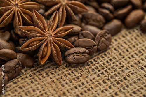 Roasted coffee beans, anise on sackchoth © sonia_ai