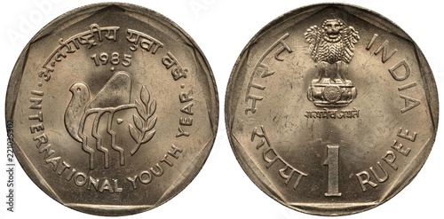 India Indian coin 1 one rupee 1985, subject International Youth Year, stylized faces in front of bird, value under Asoka lion pedestal,  photo