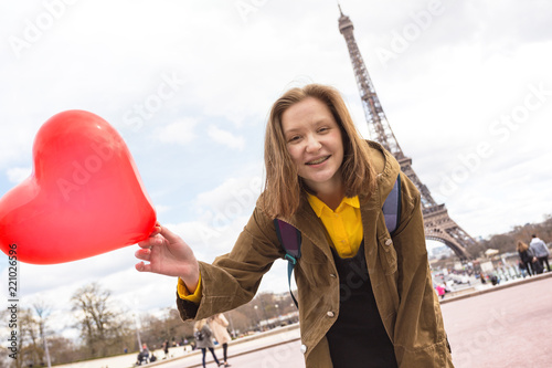 girl on the background of the Eiffel Tower